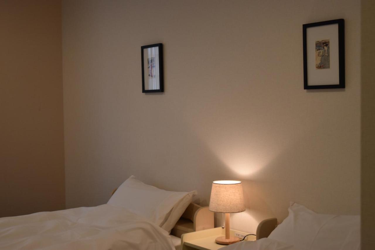 Hostel Viaggio Осака Экстерьер фото